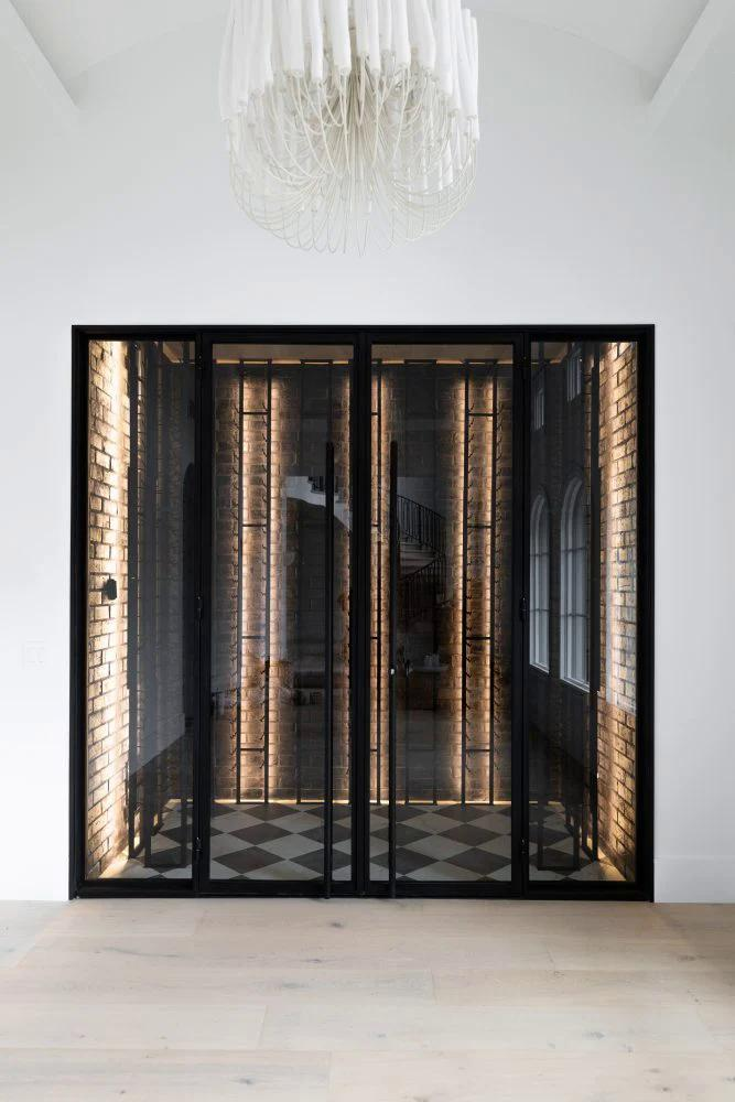 Custom steel and glass wine room